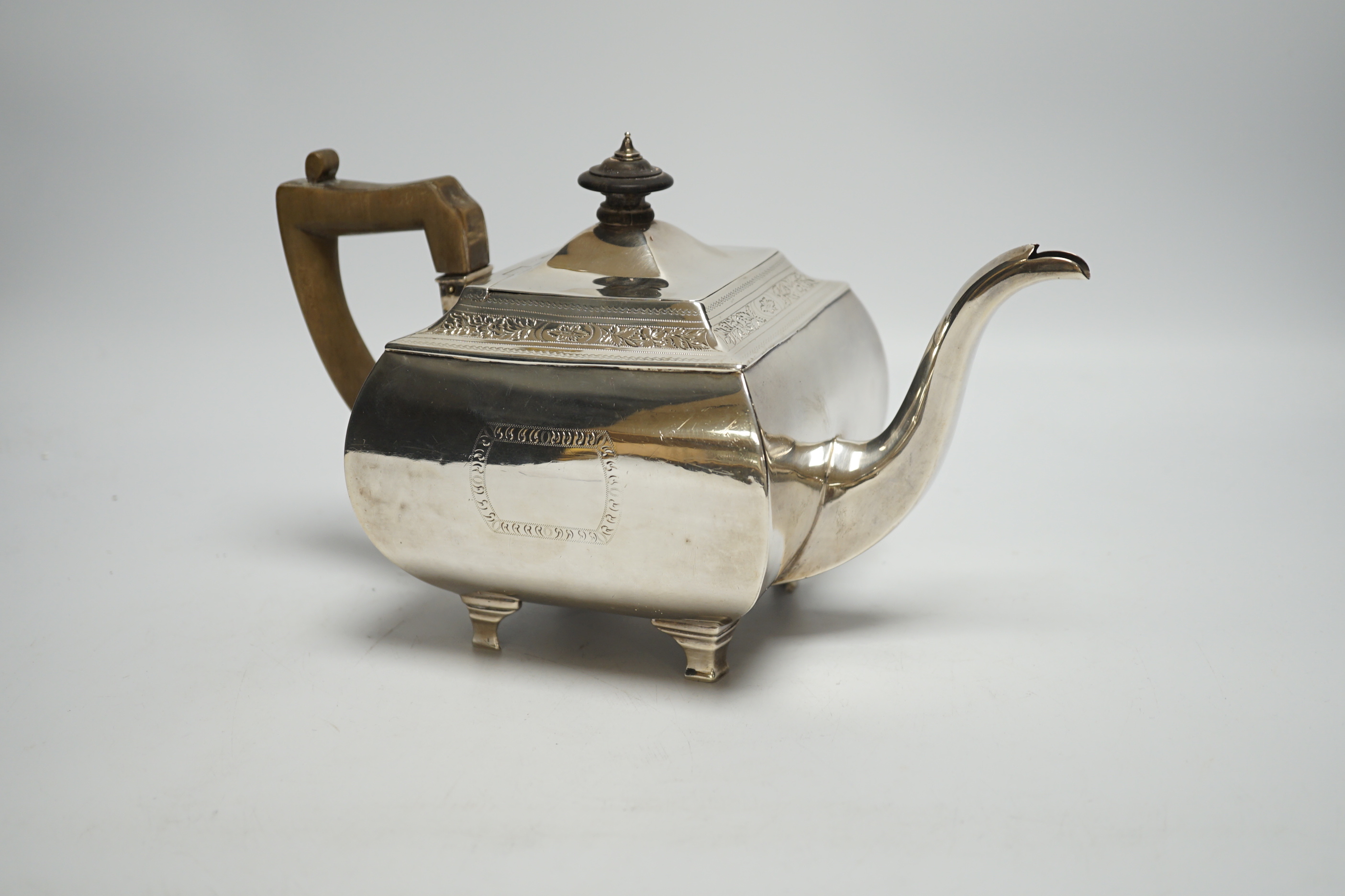 A George III silver shaped square teapot, by Urquhart & Hart, London, 1805, on bracket feet, gross weight 19.4oz.